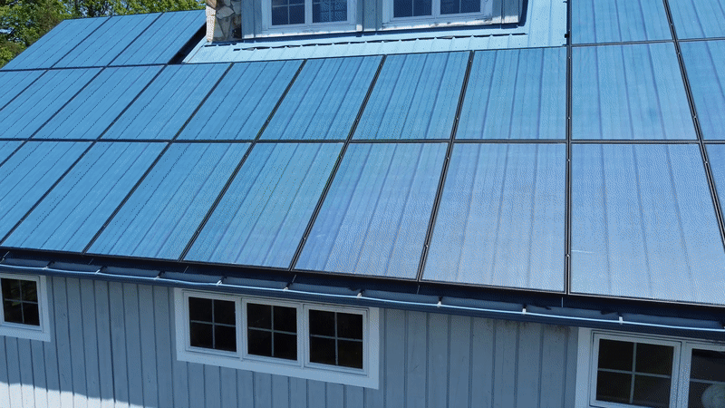 Blue SolarSkin helps solar panels blend in with blue metal roof. Texture also replicated in detailed graphics